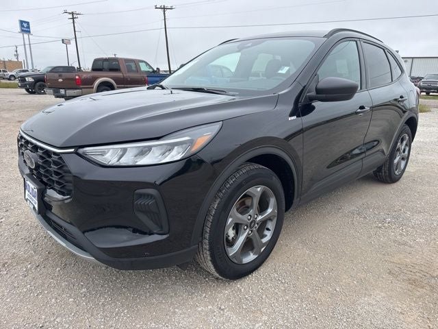 2025 Ford Escape ST-Line in Agate Black Metallic — front three-quarter view