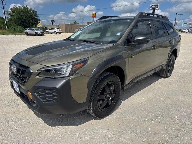 2024 Subaru Outback Wilderness in Green Metallic — front three-quarter view