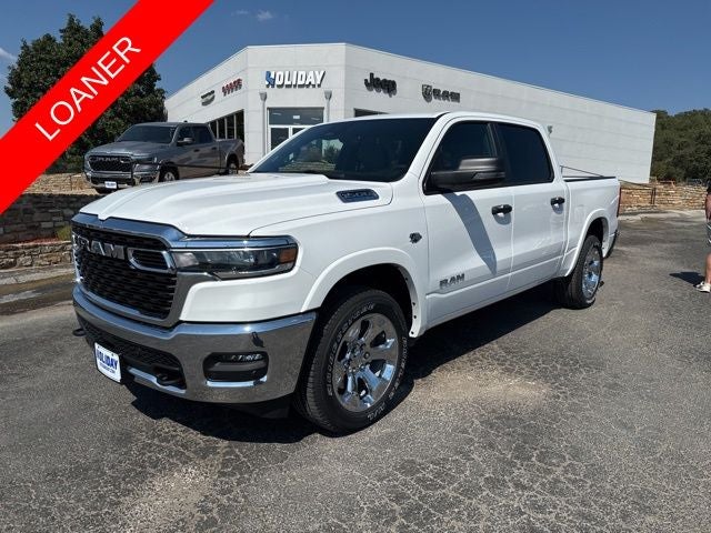 2026 RAM Ram 1500 RAM 1500 LONE STAR CREW CAB 4X4 5'7' BOX in Bright White Clear-Coat Exterior Paint — front three-quarter view