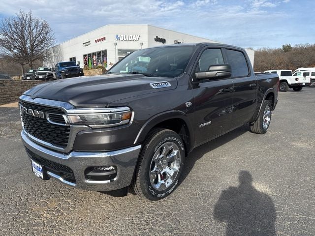 2026 RAM Ram 1500 RAM 1500 LONE STAR CREW CAB 4X4 5'7' BOX in Granite Crystal Metallic Clear-Coat Exterior Paint — front three-quarter view