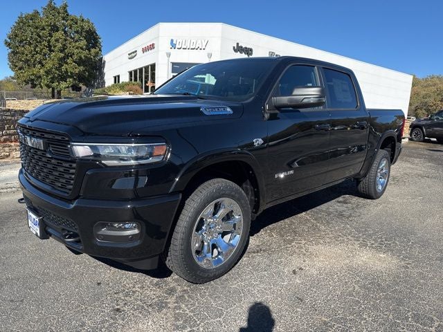 2026 RAM Ram 1500 RAM 1500 LONE STAR CREW CAB 4X4 5'7' BOX in Diamond Black Crystal Pearl-Coat Exterior Paint — front three-quarter view