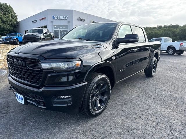 2026 RAM Ram 1500 RAM 1500 LONE STAR CREW CAB 4X4 5'7' BOX in Diamond Black Crystal Pearl-Coat Exterior Paint — front three-quarter view