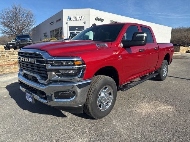 2026 RAM Ram 2500 RAM 2500 TRADESMAN CREW CAB 4X4 6'4' BOX in Molten Red Pearl-Coat Exterior Paint — front three-quarter view