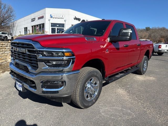 2026 RAM Ram 2500 RAM 2500 TRADESMAN CREW CAB 4X4 6'4' BOX in Molten Red Pearl-Coat Exterior Paint — front three-quarter view