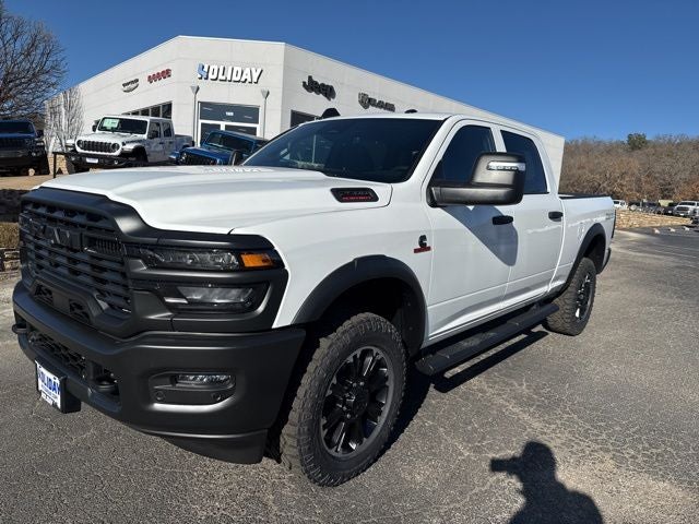 2026 RAM Ram 2500 RAM 2500 WARLOCK CREW CAB 4X4 6'4' BOX in Bright White Clear-Coat Exterior Paint — front three-quarter view