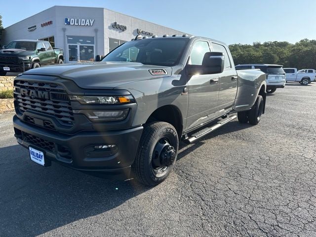 2026 RAM Ram 3500 RAM 3500 TRADESMAN CREW CAB 4X4 8' BOX in Ceramic Gray Clear-Coat Exterior Paint — front three-quarter view