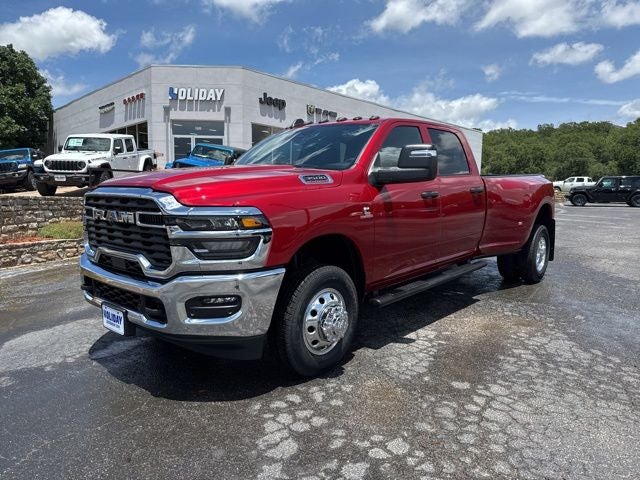 2026 RAM Ram 3500 RAM 3500 TRADESMAN CREW CAB 4X4 8' BOX in Molten Red Pearl-Coat Exterior Paint — front three-quarter view